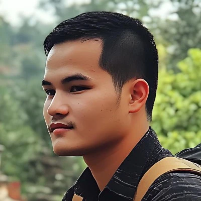 A young man with neatly styled black hair, wearing a black shirt and carrying a backpack, looking confidently into the distance with a serene outdoor background. As a dedicated Kuyaplay player, he enjoys strategic gaming, thrilling challenges, and exciting rewards.
